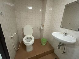 OYO 75494 President Apartment