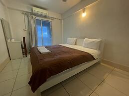 OYO 75494 President Apartment