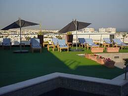 Golden Tulip Muscat