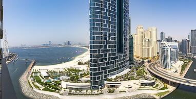 Waves - High-Rise Elegance: 2BR Apt with Marina Views