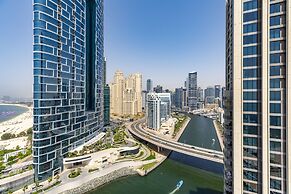 Waves - High-Rise Elegance: 2BR Apt with Marina Views
