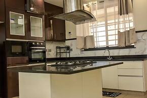Lux Suites Tabere Heights Apartments