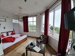 Goroomgo Hotel Aqua Waterfall Dharamsala