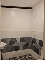 Tambayan Rooms & Cottages by SMS Hospitality