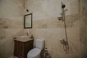 ASMA CAVE HOUSE