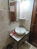 ASMA CAVE HOUSE