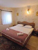 ASMA CAVE HOUSE