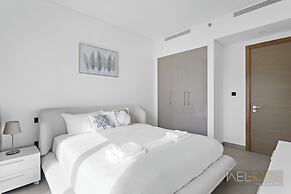 WelHome - Charming Apt With City Lights in Sobha Waves