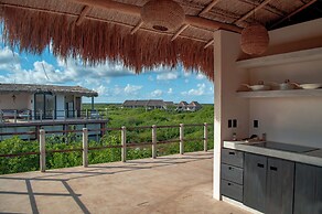 Hotel Caimán Habitat Tulum Beach