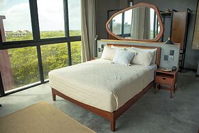 Hotel Caimán Habitat Tulum Beach