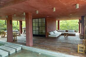 Hotel Caimán Habitat Tulum Beach