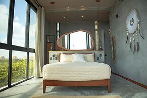 Hotel Caimán Habitat Tulum Beach