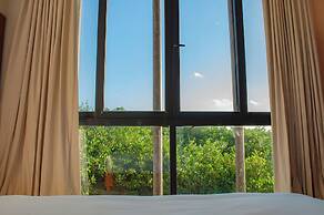 Hotel Caimán Habitat Tulum Beach