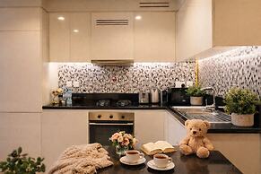 Chic 2BR Urban Escape in Aykon City