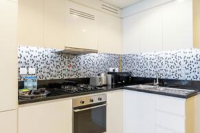 Chic 2BR Urban Escape in Aykon City