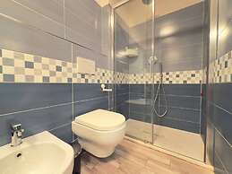 Moderno Bilocale con Terrazzo e Parcheggio