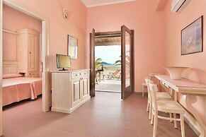Residence with private beach in Bosa Marina