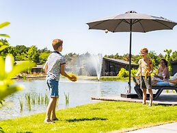 Chalet by Pond in Holiday Park