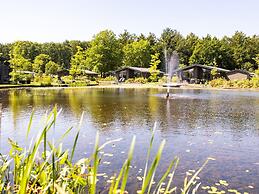 Chalet by Pond in Holiday Park