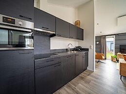 Nice Chalet With Combi Microwave, Near the Maas