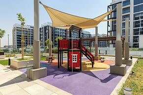 Waves - Azizi Riviera 24: Modern 1 Bedroom Apartment