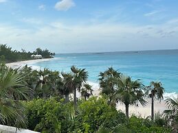 Twin Coves Tranquility: Private Beachfront Estate