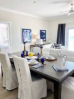 Oceanfront Haven: Elegant Estate With Private Deck