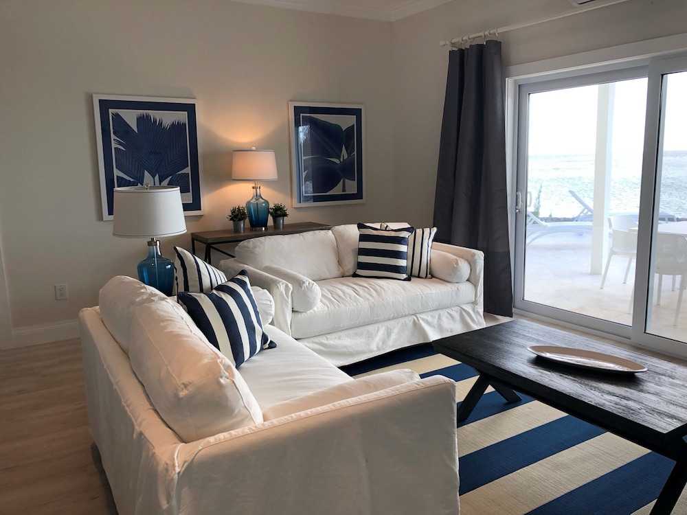 Oceanfront Haven: Elegant Estate With Private Deck