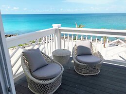 Oceanfront Haven: Elegant Estate With Private Deck
