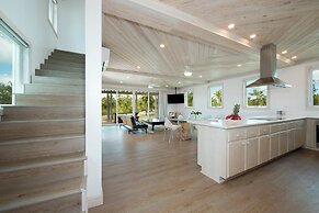 Tropical Haven: Luxurious Home Steps From Beach