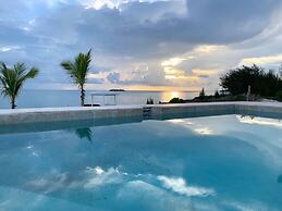 Oceanfront Elegance: New Home With Dock, Kayaks, And Pool