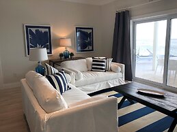Oceanfront Elegance: New Home With Dock, Kayaks, And Pool