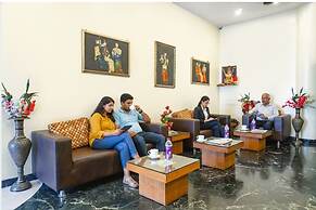 FabHotel Golden Emerald
