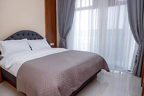 Q-Plus Apartments