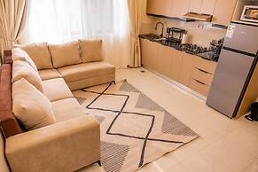 Q-Plus Apartments