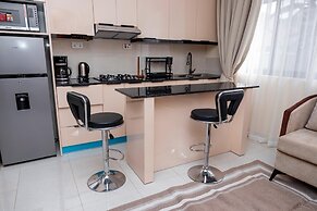 Q-Plus Apartments