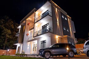 Q-Plus Apartments