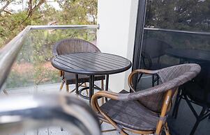 Q-Plus Apartments