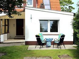Apartment With a High Chair and bed