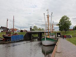 Apartment With a High Chair and bed