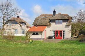 Thatched Villa With Bath in a Holiday Park