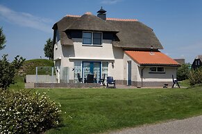 Thatched Villa With Bath in a Holiday Park
