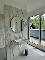 THE WOS Apartments
