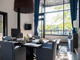 Lakeside Luxury Mansion by Belvilla