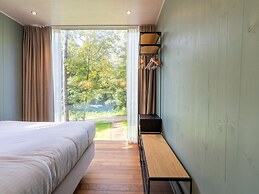 Belvilla Dreamy Lodge in the Woods