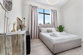 Waves - Stylish 1BR in JVC with Balcony & Pool