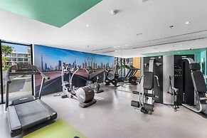Waves - Stylish 1BR in JVC with Balcony & Pool