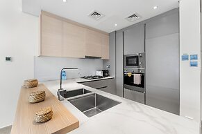 Waves - Stylish 1BR in JVC with Balcony & Pool