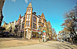 Red by Grand Apartments