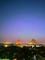 Pyramids sun temple view Inn